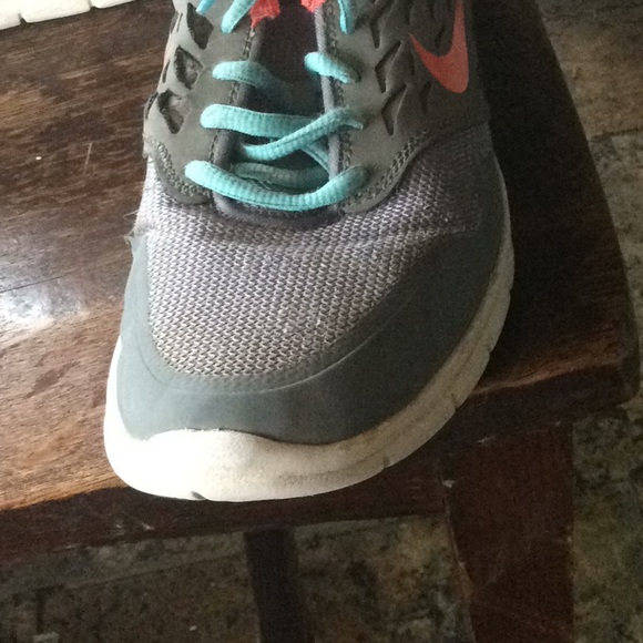 Pink, Blue and Grey Nike women’s running shoes. - Picture 5 of 7